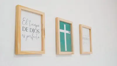 three picture frames hanging on a white wall at OCASSO JARDIN APARTAMENTO AZULEJO in Jardin