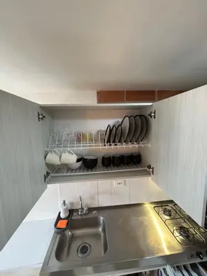 a kitchen with a sink and a counter top at Increíble Apartaestudio Cerca al Centro Comercial Los Molinos in Medellín