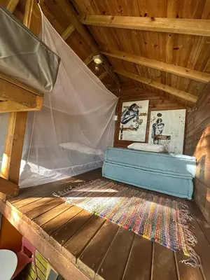 a inside of a tent with a mattress in it at LA CASA EN EL AIRE - Abejorral in Abejorral