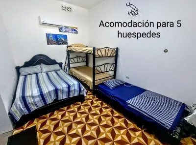 a bedroom with two bunk beds in a room at SAN SENDERISMO ROOM in Mariquita