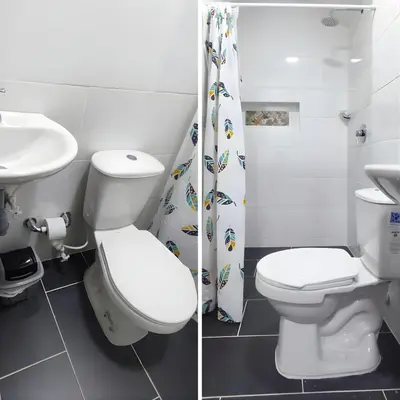a bathroom with a toilet and a sink at CASA ESTADIO MEDELLIN Amplio Apartamento Renovado para Familias, Grupos o Delegaciones Deportivas cerca al Estadio Atanasio Girardot - Laureles-Estadio in Medellín