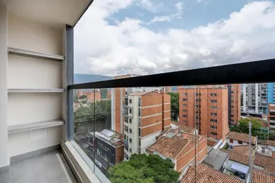 a view from the window of a building at Apartamentos HOUSY Laureles in Medellín