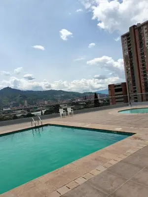 a swimming pool on the roof of a building at Apartamento Sabaneta Antioquía in Sabaneta