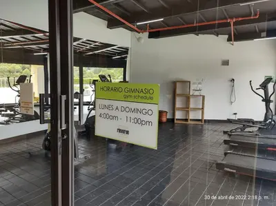 a sign in a room with a gym at Hotel en Rionegro-Rioverde- Apartamento in Rionegro