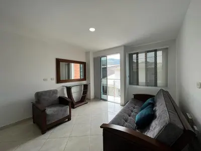 a living room with a couch and a chair at Penthouse San Rafael in San Rafael