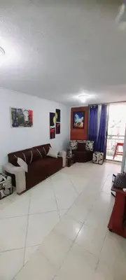 a living room with a couch and a table at apartamento centro de la ciudad in Medellín
