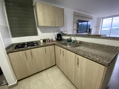 a kitchen with a sink and a counter top at Apartamento Mirador De Castilla in Manizales