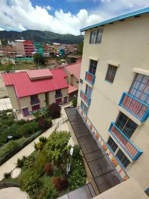 an overhead view of a building with a balcony at Apto Nuevo, Tranquilo, Bonito, 5 min Plaza Principal in Guatapé