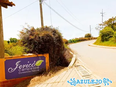 a sign on the side of a road at AZULEJO, Casa hotel campestre in Jericó