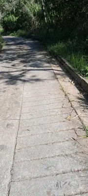 a street with aicked upphaltphalt at Casita el mirador solo naturaleza in Medellín