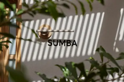 a sign on a door with the word sunba on it at Antipoda Hotel Boutique in Medellín