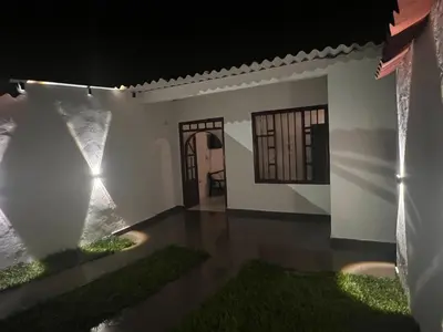 a house at night with a view of the ocean at Loft Vacacional in Mariquita