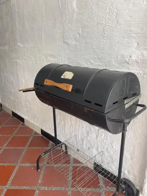 a toaster sitting on a stand next to a wall at La torrecita in Barbosa