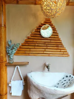 a bathroom with a sink and a staircase at Aracari Ecolodge in San Rafael