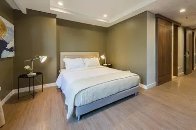a bedroom with a large bed in a room at El Tesoro Medellín Hab310 by Letoh in Medellín