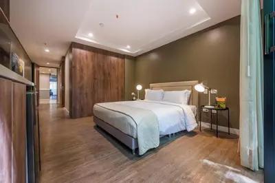 a bedroom with a large bed in a room at El Tesoro Medellín Hab315 by Letoh in Medellín