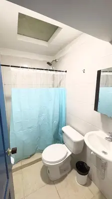 a bathroom with a toilet and a sink at Apartaestudio sector la presentacion in Manizales