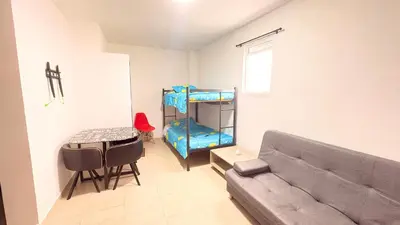 a living room with a couch and a table at Apartaestudio sector la presentacion in Manizales