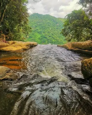 a stream of water in a river with rocks at Apartamento Balcón 201 in San Luis
