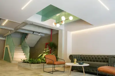 a living room with a couch and a table at B 48 Living by B Rent in Medellín
