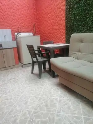 a living room with a couch and a table at Apartamento Rionegro cerca a Aeropuerto in Rionegro