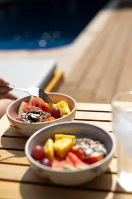 two bowls of food on a table with a fork at Casa Cedrela Hotel Boutique -Cauca Viejo- Mayores de 14 años in Jericó
