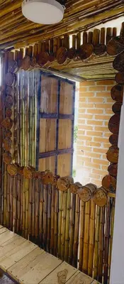 a window in a room with a wooden wall at Chalet Lupe-Eje cafetero in Palestina