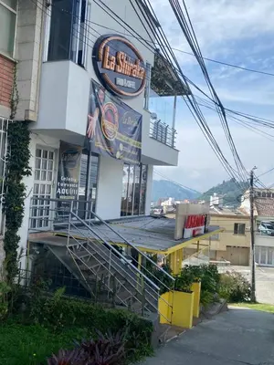 a building with a sign on the side of it at LA CASA DEL CABLE - Hermoso Apartamento - in Manizales