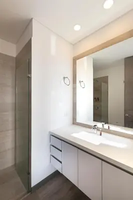 a bathroom with a sink and a mirror at Tropical Confort suite Poblado in Medellín