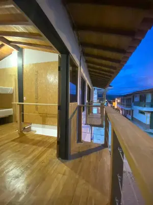 a balcony of a house with a view of the ocean at ApartaLoft Carolina in Carolina del Principe