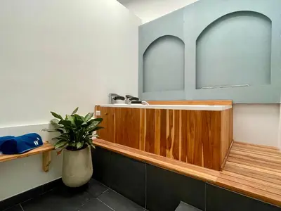 a bathroom with a sink and a potted plant at Apartments with Jacuzzi in El Poblado by Wynwood House in Medellín
