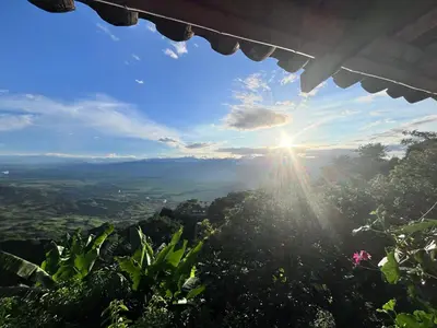 a view of the sun from the top of a mountain at Zioru cabaña in Belalcázar