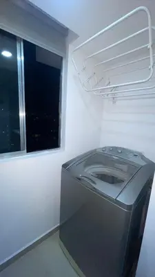 a washing machine in a room with a window at Habitación Masculina 1 persona en Apartamento Compartido Medellín in Medellín