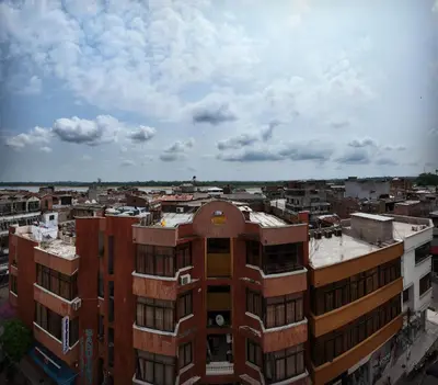 an overhead view of a city with buildings at Hotel Sandiego in Puerto Berrío