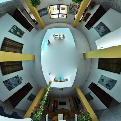 an overhead view of a spiral staircase in a building at Hotel Sandiego in Puerto Berrío