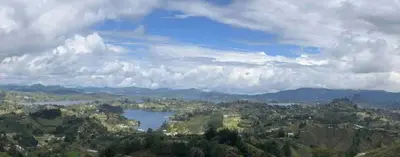 a view of a lake in the middle of a city at Montecielo Hosting in Guatapé