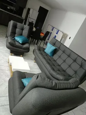 a living room with two couches and a couch at cool de laureles Medellín in Medellín