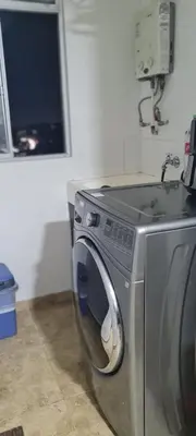 a kitchen with a washing machine in a room at Casalba in Bello