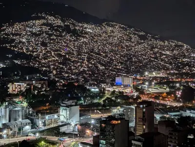 a view of a city at night at Casalba in Bello