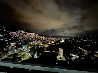 a view of a city at night at Casalba in Bello