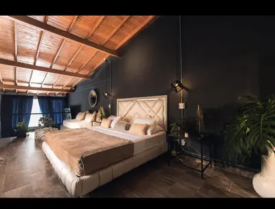 a large bedroom with a large bed in a room at PROVENZA LUXURY APARTMENTS TERRAZA in Medellín