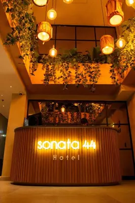 a restaurant with a sign that reads sonato ahibo at Sonata 44 Hotel Laureles in Medellín