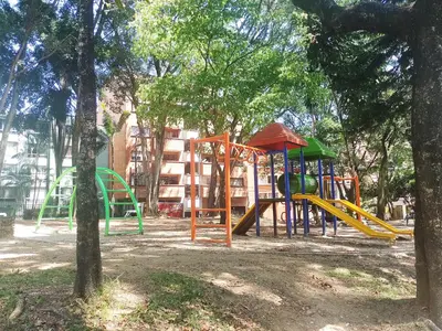 a park with a playground with a slide at Casa zona Laureles in Medellín