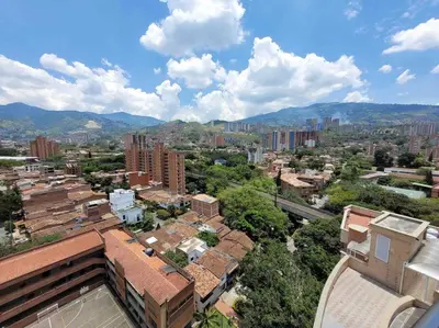 an overhead view of a city with buildings and trees at Apartamento acogedor barrio la Floresta Medellín in Medellín
