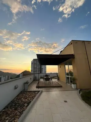 a balcony of a building with a sky at Loft moderno en zona exclusiva in Manizales