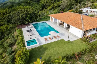 an aerial view of a house with a swimming pool at Quinta San Felipe in Manizales