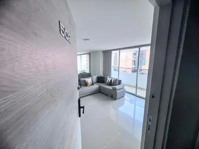 a view of a living room with a couch at Medellin's Coolest neighborhood in Medellín
