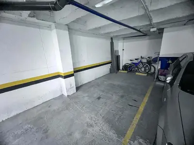 an empty parking garage with bikes parked in it at Medellin's Coolest neighborhood in Medellín