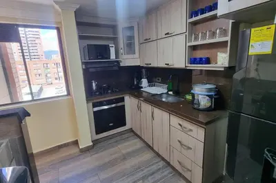 a kitchen with a sink and a counter top at apto a 3 cuadras del estadio espectacular in Medellín