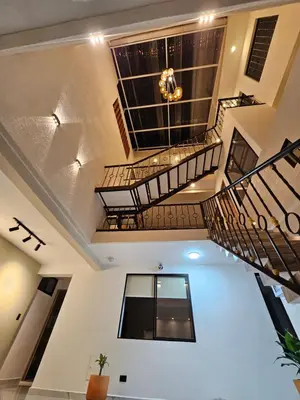 a view from the second floor of a building with stairs at Casa Hotel La Bonita in Medellín